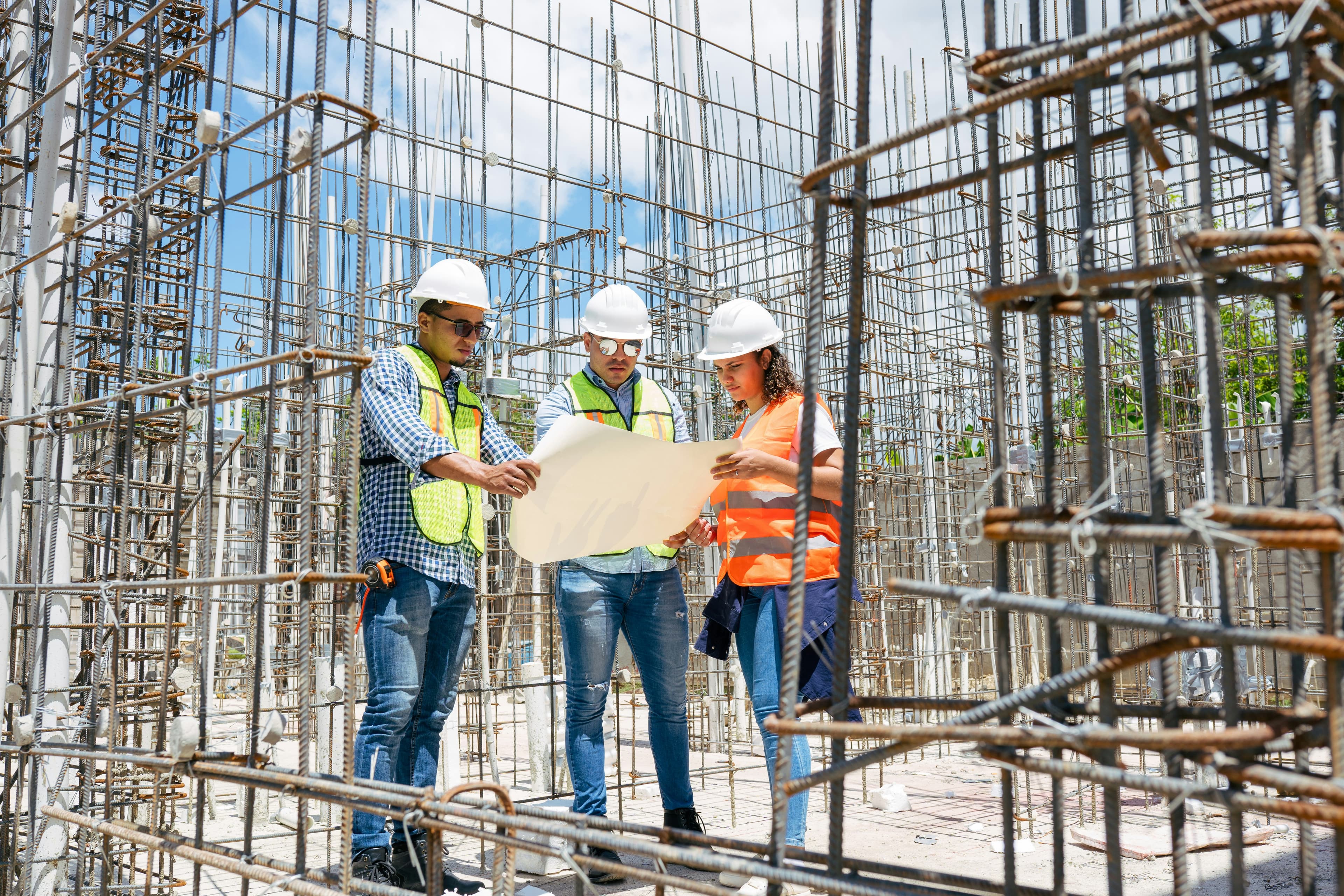 General contractors reviewing drawings on site